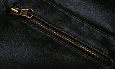 Zipper on the black leather texture as b clipart