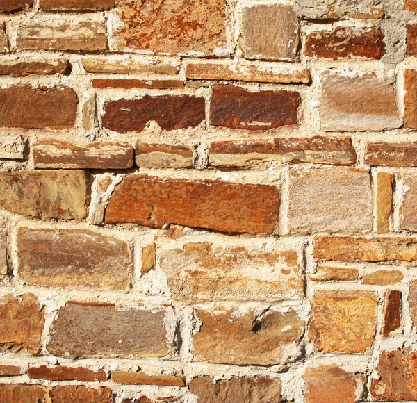 Анотація старої барвистої кам'яної стіни як спинка — стокове фото
