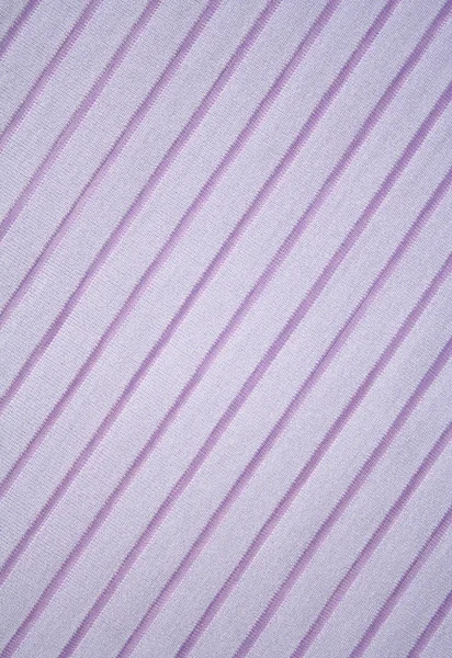 Розовые полоски на ткани в качестве фона — стоковое фото