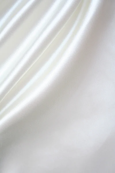 Sima, elegáns fehér selyem háttérként — Stock Fotó
