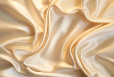 Smooth elegant gold satin as background clipart