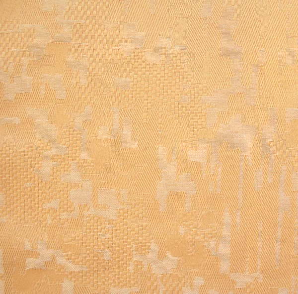 Желтая ткань в качестве фона — стоковое фото