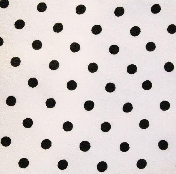 White fabric with black peas — Stock Photo, Image