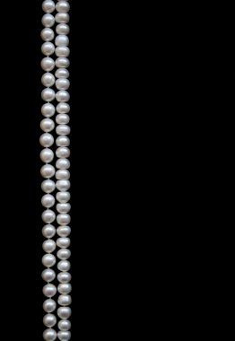 White pearls on the black silk clipart