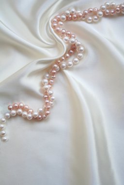 White silk with white and pink pearls clipart