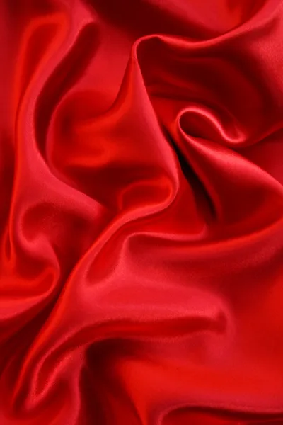 Гладкий червоний шовк як фон Ліцензійні Стокові Фото