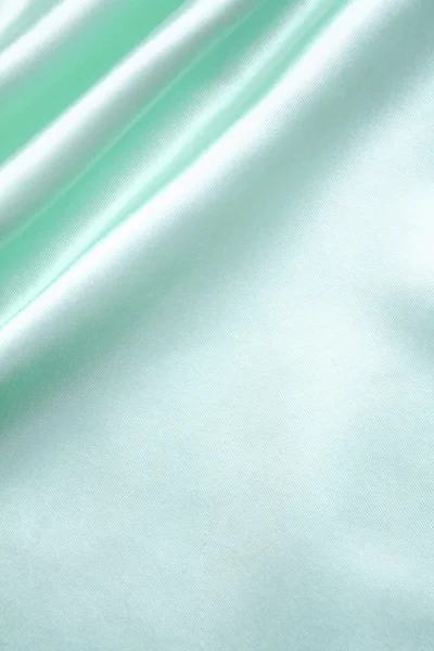 Гладкий элегантный лазурный шелк — стоковое фото