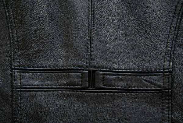 Detail of a black leather waistcoat — Stock Photo, Image