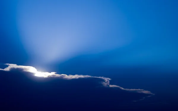 Solen bakom molnen — Stockfoto