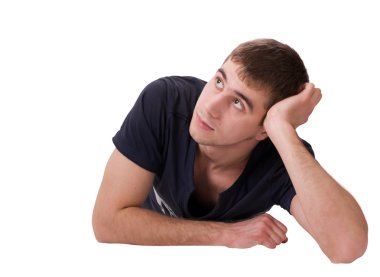 Thoughtful young man lying clipart