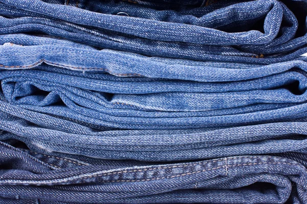 Stack of Blue Jeans Background — Stock Photo, Image