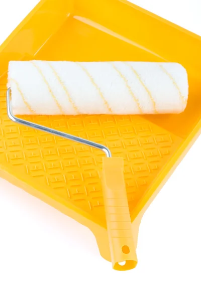Paint roller in paint tray — Stock Photo, Image