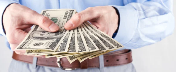 Money in the hands of the businessman — Stock Photo, Image