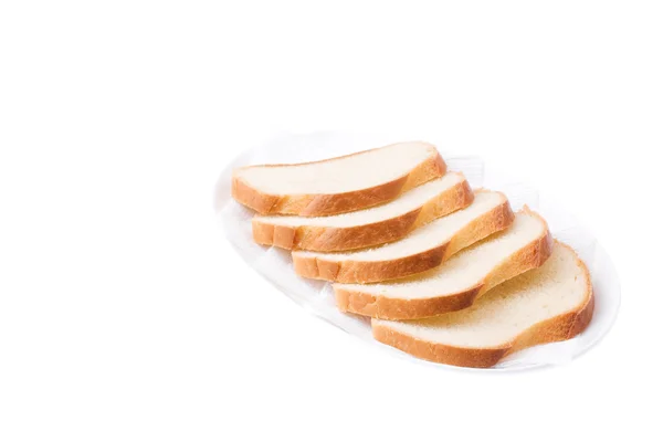 Pão fatiado no prato. Apetite Bon ! — Fotografia de Stock