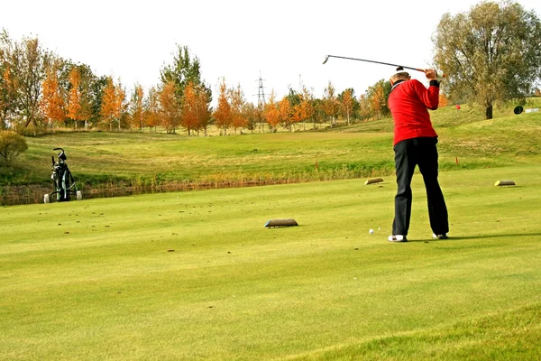 Golfspelare swing — Stockfoto