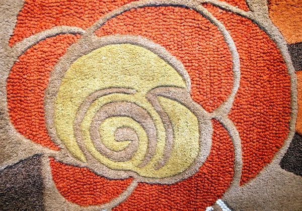 Detalle de alfombra con flor — Foto de Stock