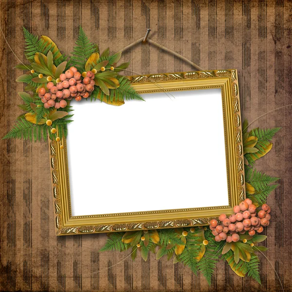 Picture gold frame with a decorative pat — Stock Photo, Image