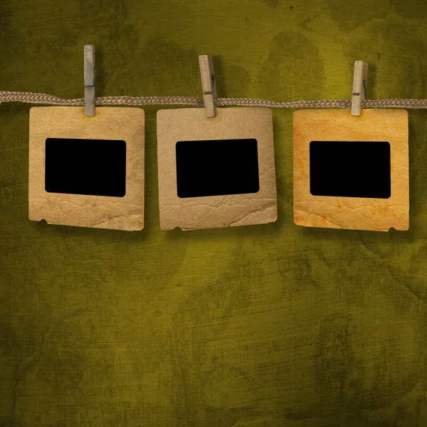 Old photoframes are hanging in the row o — Stock Photo, Image
