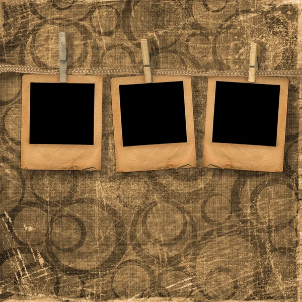 Old photoframes are hanging in the row o — Stock Photo, Image