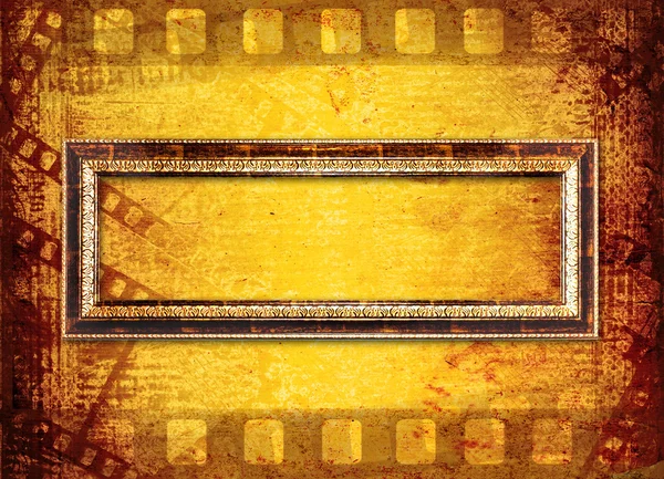 Starý filmový pás na pozadí papíru — Stock fotografie