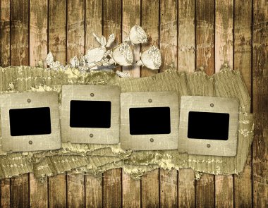 Old slides on the wooden background clipart