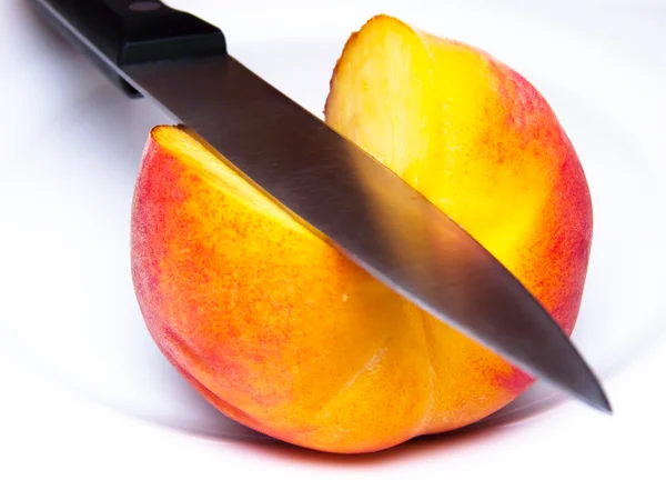 stock image Ripe peach knifed