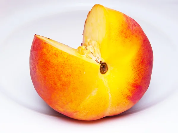 stock image Ripe peach knifed