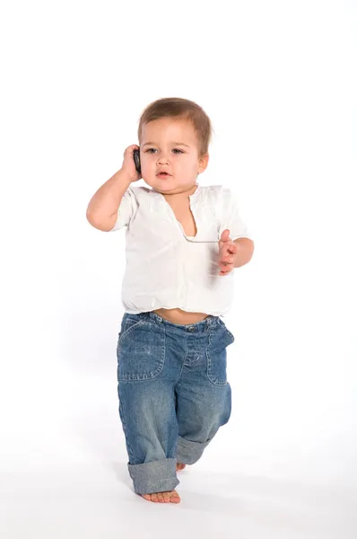 Случайный ребенок с телефоном — стоковое фото