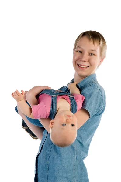 Madre mantenga hija cabeza sobre talones —  Fotos de Stock