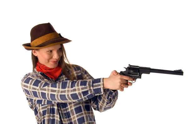 Cowgirl souriante avec pistolet viser quelqu'un — Photo