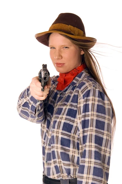 Cowgirl souriante avec pistolet viser quelqu'un — Photo