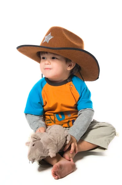 Menino feliz em chapéu de cowboy — Fotografia de Stock
