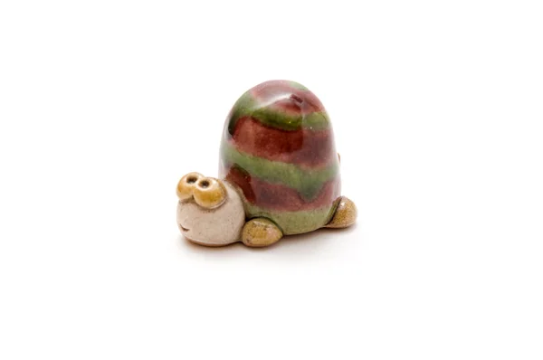 Funny striped ceramic snail — Stock Photo, Image