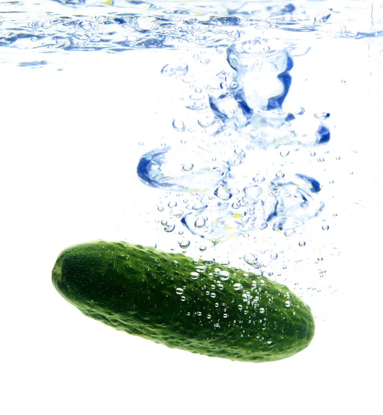 stock image Bubbles forming in water after green cuc