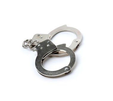 Pair of handcuffs isolated on a gray background clipart