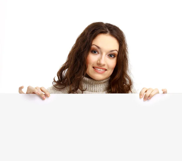 Closeup portret van een jonge zakenvrouw met billboard geïsoleerd op wit — Stockfoto
