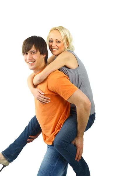 Åka snålskjuts - lyckliga unga tonåriga par roar sig mot whit — Stockfoto