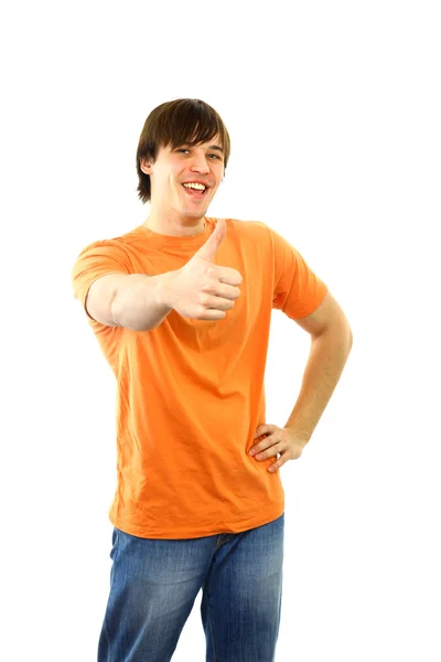 スマートな若い男は親指を身振りで示す — ストック写真