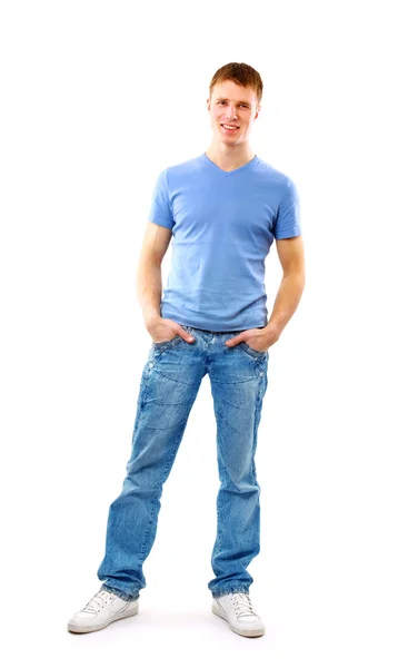 Νεαρός άνδρας στέκεται με τα χέρια στις τσέπες — Φωτογραφία Αρχείου