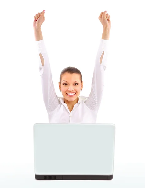 Business woman with her hands raised while working on laptop — Stock Photo, Image