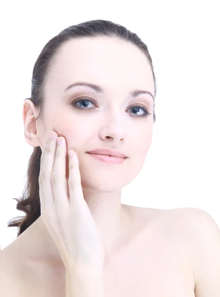 Bellissimo viso femminile giovane con una carnagione benessere isolato su bianco — Foto Stock