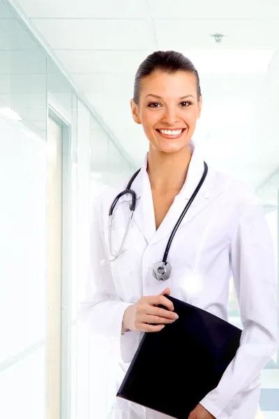 Beautiful young doctor with stethoscope — Stock Photo, Image