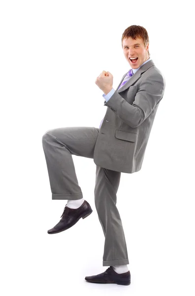 Un uomo d'affari molto felice ed energico con le braccia alzate — Foto Stock