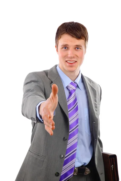 Joven hombre de negocios saludo con apretón de manos aislado en blanco — Foto de Stock