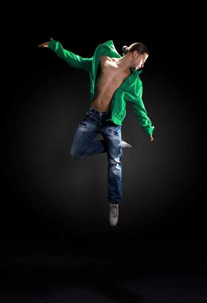 Modern dancer poses in front of the old — Stock Photo, Image