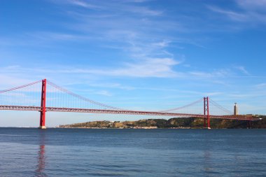 Large bridge over river in Lisbon clipart