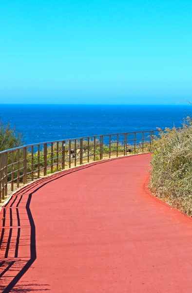 stock image Bicycle lane road on red asphalt road in