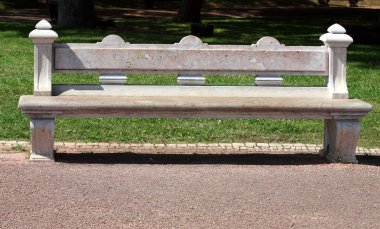 Stone bench in park clipart