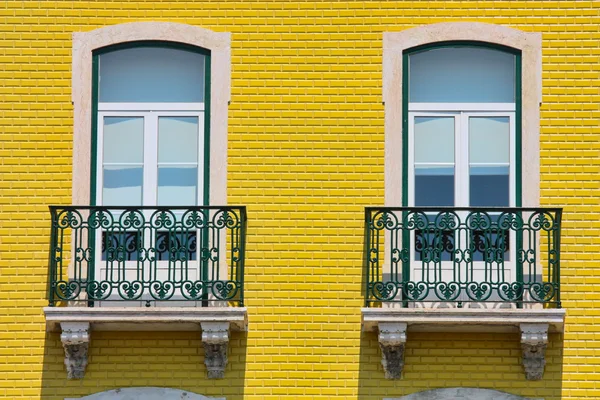 Two windows on orange vivid wall — Stock Photo, Image