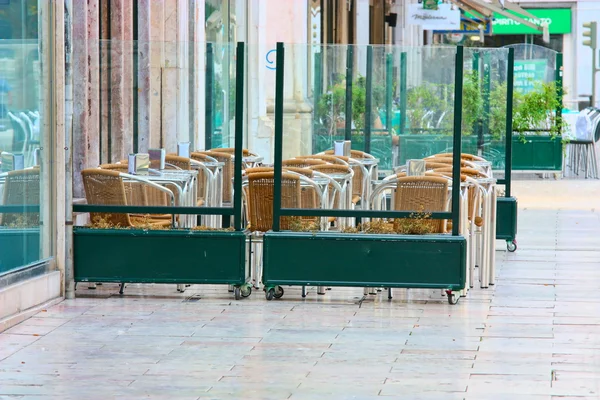 Empty tables in street cafe — Stock Photo, Image